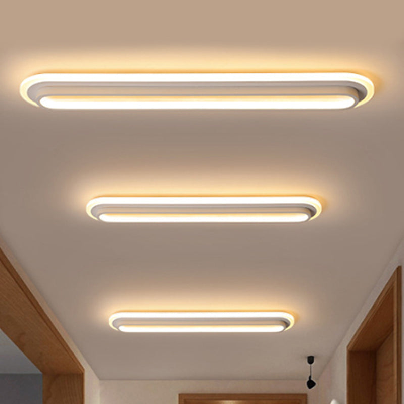 Oval LED Ceiling Light With Black Or White Housing And Acrylic Diffuser