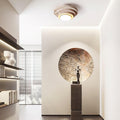 Lampada da soffitto LED Solstone in travertino con luce calda