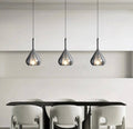 Minimalistické chromové závěsné lampy ve tvaru kapky pro moderní interiéry
