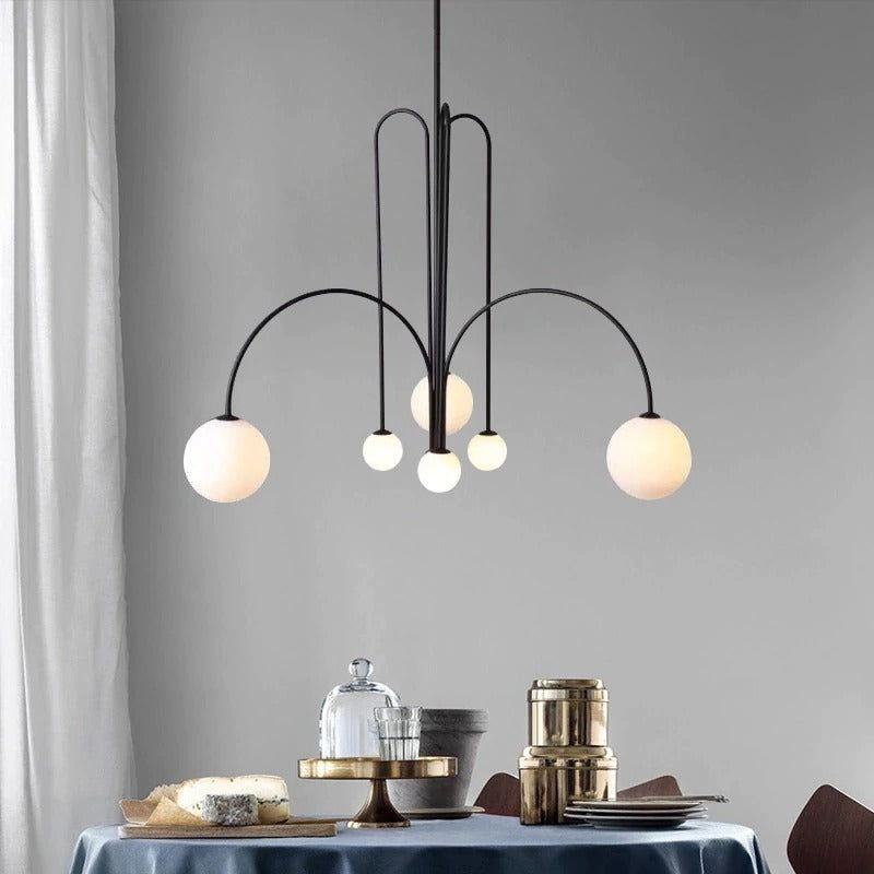 Lampada a sospensione Nova Crest con vetro audace e finitura in metallo