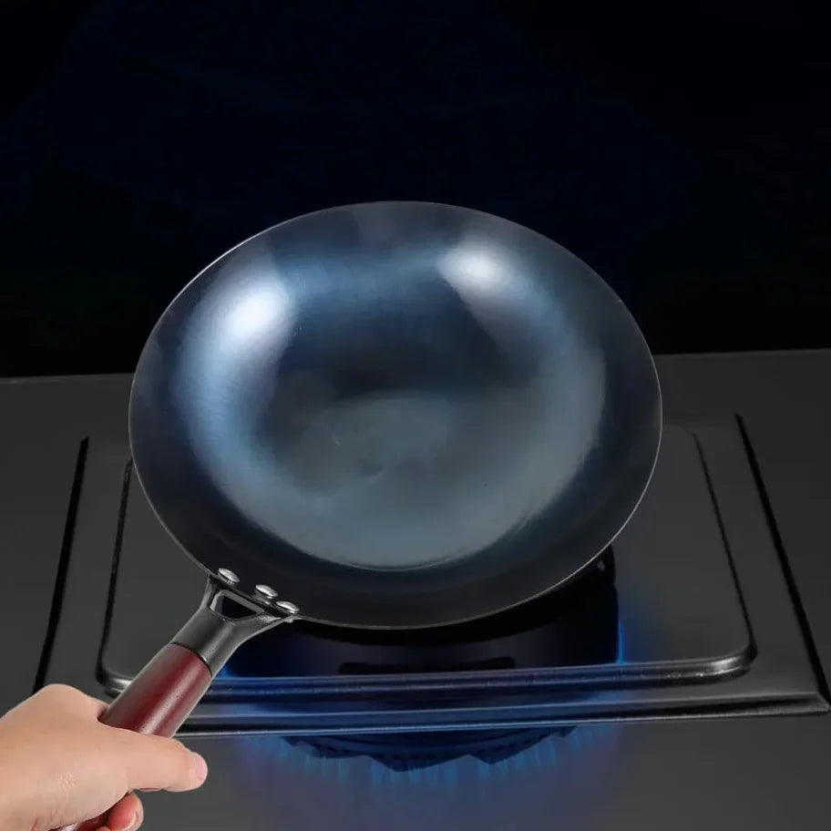 ForgeMaster – Traditional hand-forged cast iron wok with wooden handle