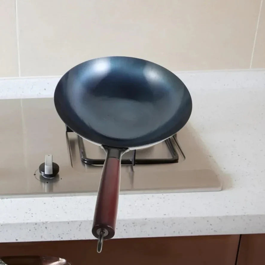 ForgeMaster – Traditional hand-forged cast iron wok with wooden handle