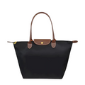 Tidløs nylon-tote med brun læderkant og gulddetaljer