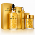 ערכת טיפוח עור Gilded Glow עם ניאצינמיד, סרום נגד הזדקנות ומסיר כהויות תחת העיניים